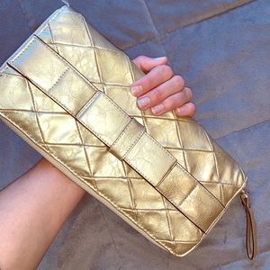 The Limited gold clutch
